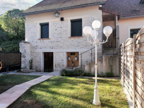 Maison de charme à Sainte-Geneviève-lès-Gasny avec jardin